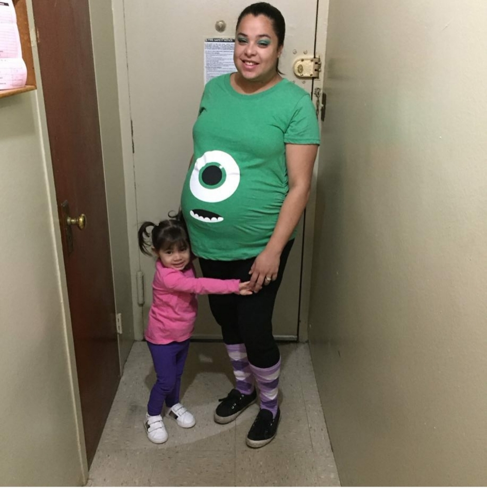 A green maternity shirt